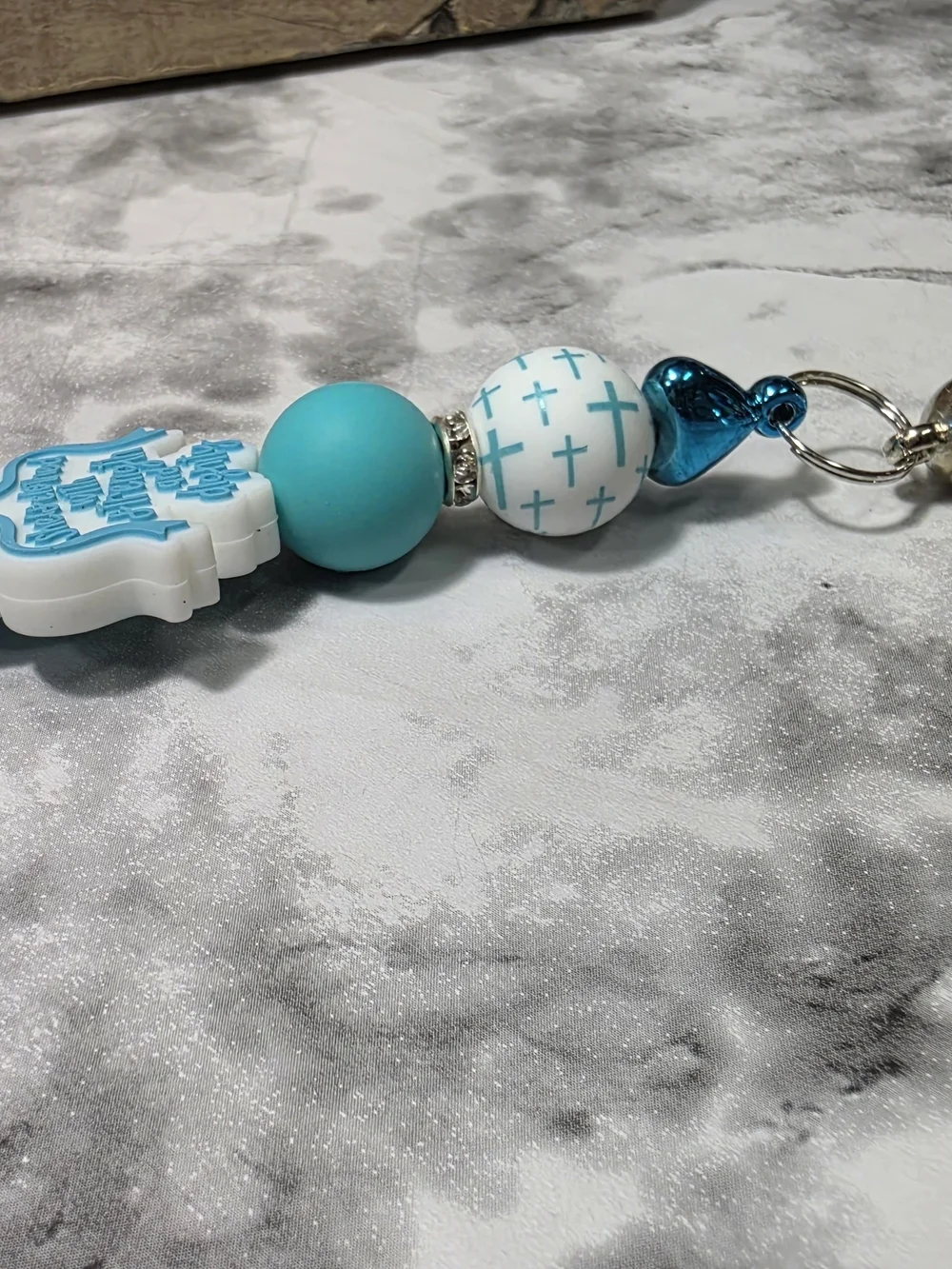Handmade Turquoise Cross Bead Keychain with White Tassel